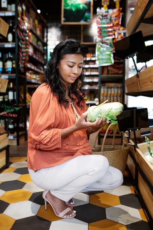 Creator reviewing a vertical video ad on a smartphone