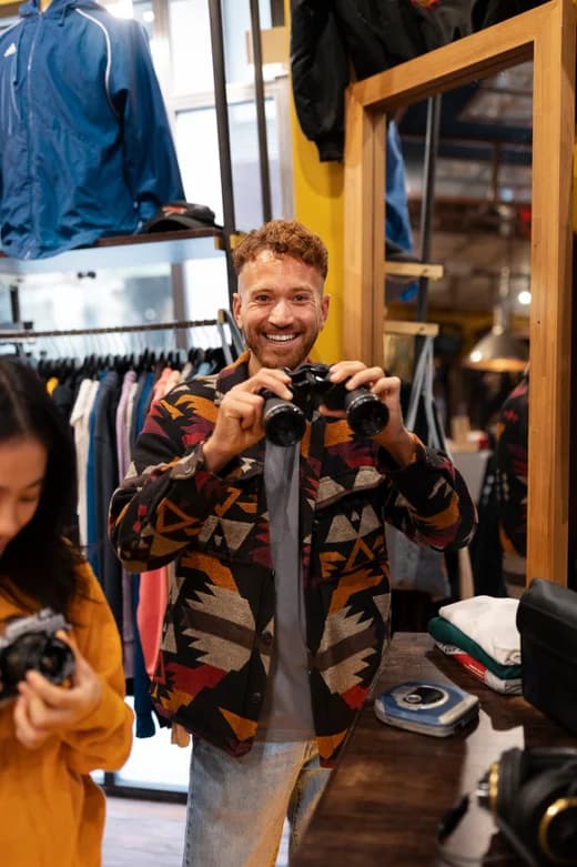 Team discussing campaign creative on a laptop