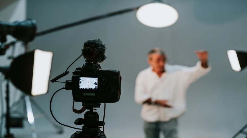 Professional cinema camera on set representing traditional video production costs