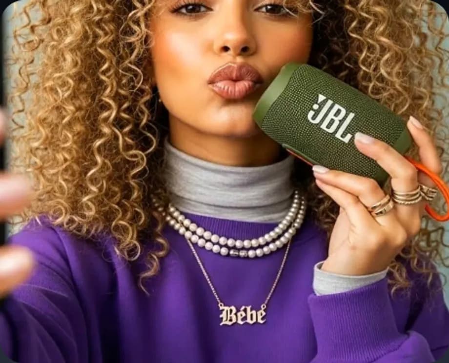 Creator holding a JBL speaker in a UGC-style ad template preview