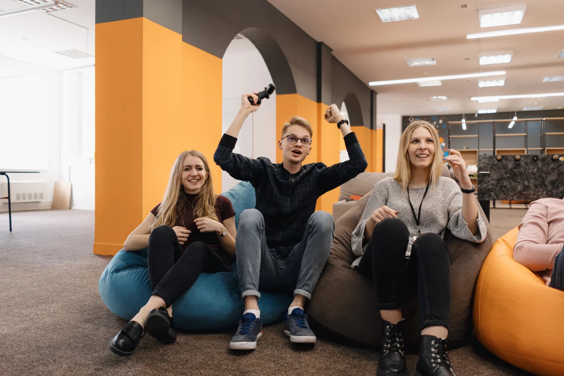 VidAU team collaborating in a bright open office