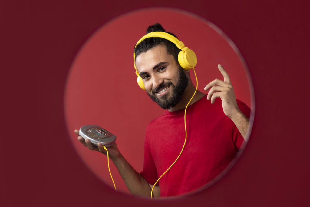 portrait man listening music – VidAU.ai Man listening to audio after using the best YouTube to Mp3 Converter