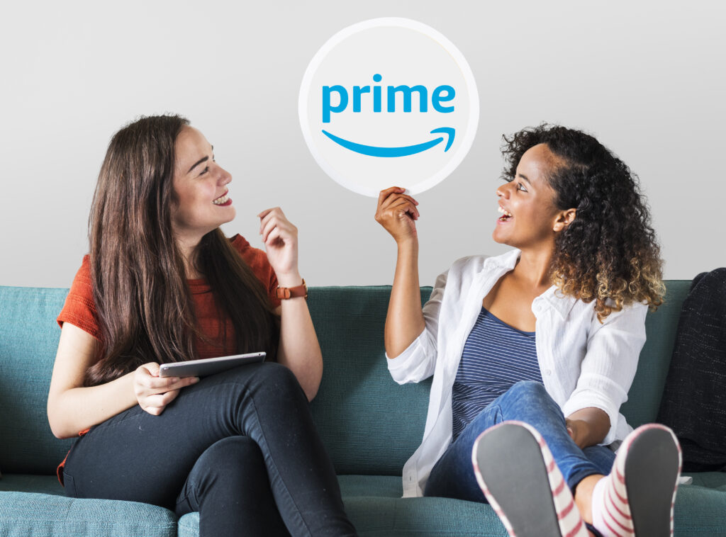 Woman holding emoticons on a couch amazon product reviewer