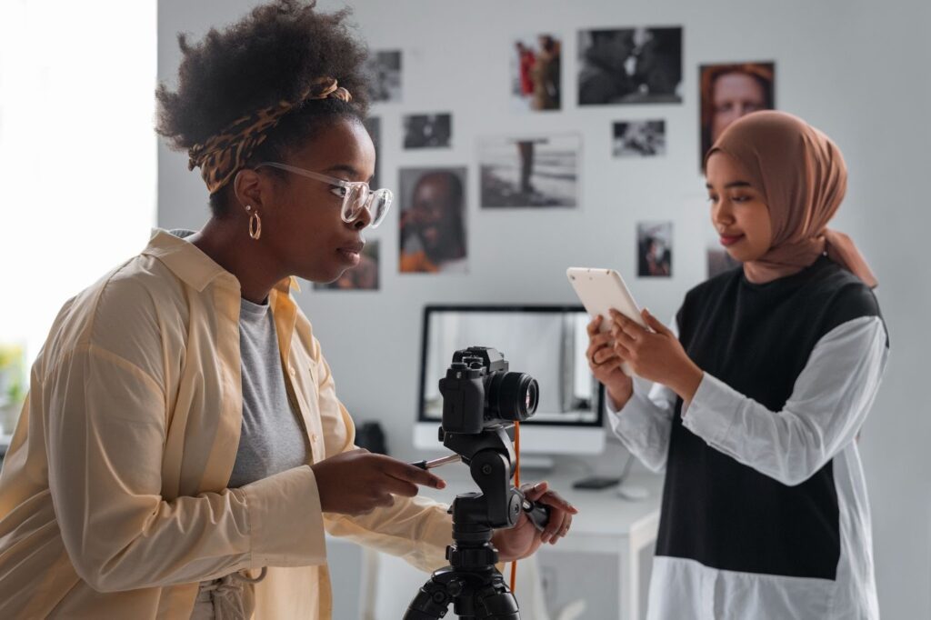 image – VidAU.ai A lady recording tutorial videos with her colleague