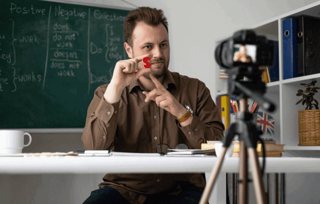 youtube video editor – VidAU.ai A teacher recording how to create training videos using opusclip