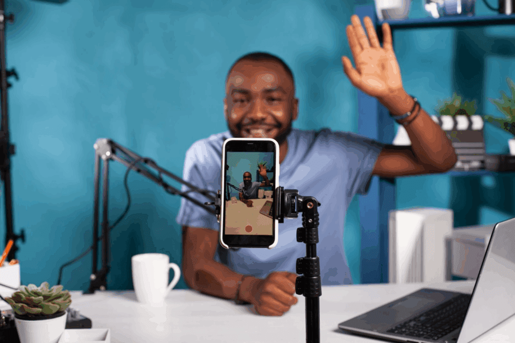 image – VidAU.ai A man creating a video to address how to make reels without showing face