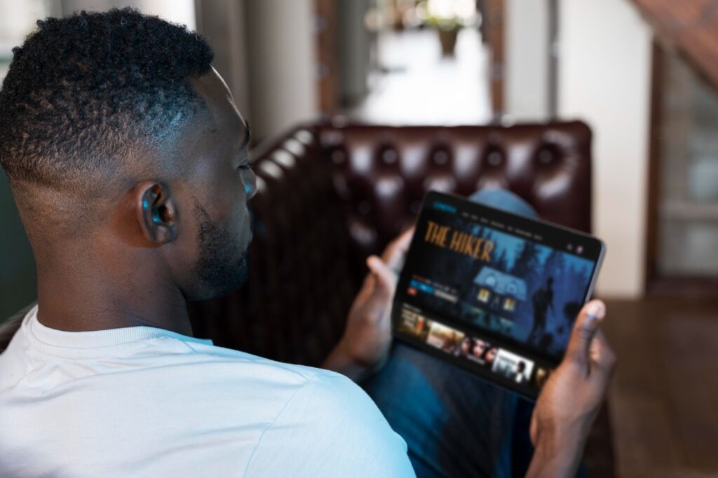 image – VidAU.ai A man playing his converted mkv to mp4 movie