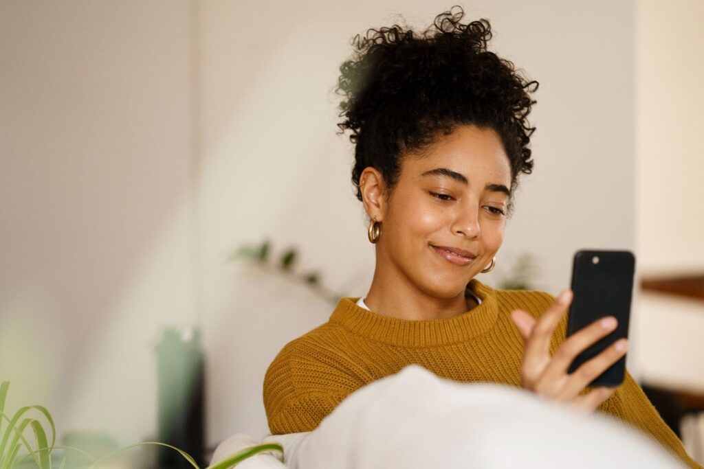 Instagram Post templates – VidAU.ai A lady taking advantage of instagram post templates to make her content calendar schedule easy