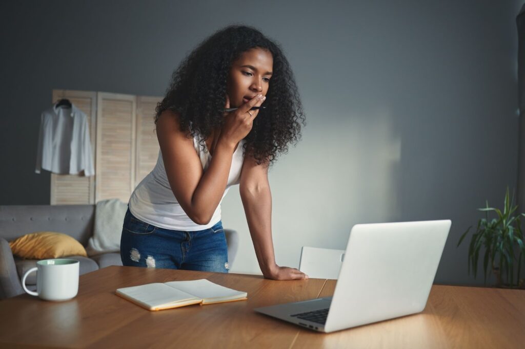 How to cancel shopify subscription – VidAU.ai A woman wondering if she should cancel shopify plan or pause shopify store