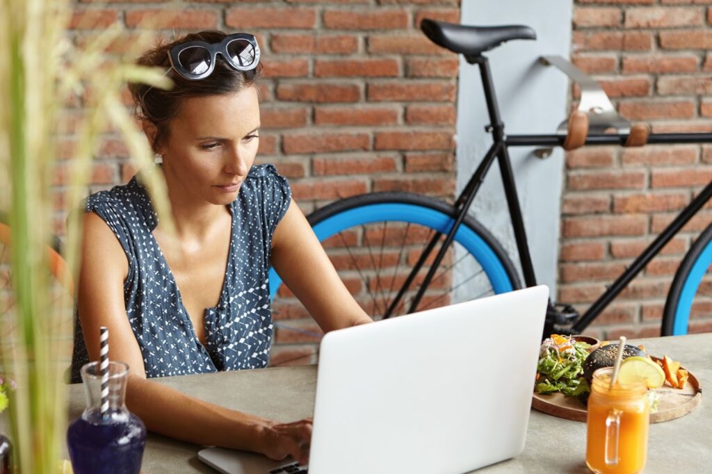 image – VidAU.ai A lady reading through Google Veo 3 review before making a purchase