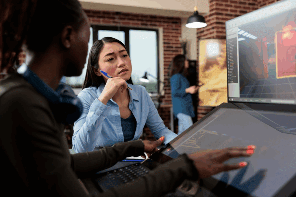 image – VidAU.ai A lady teaching her teammate how the saas product video should look like