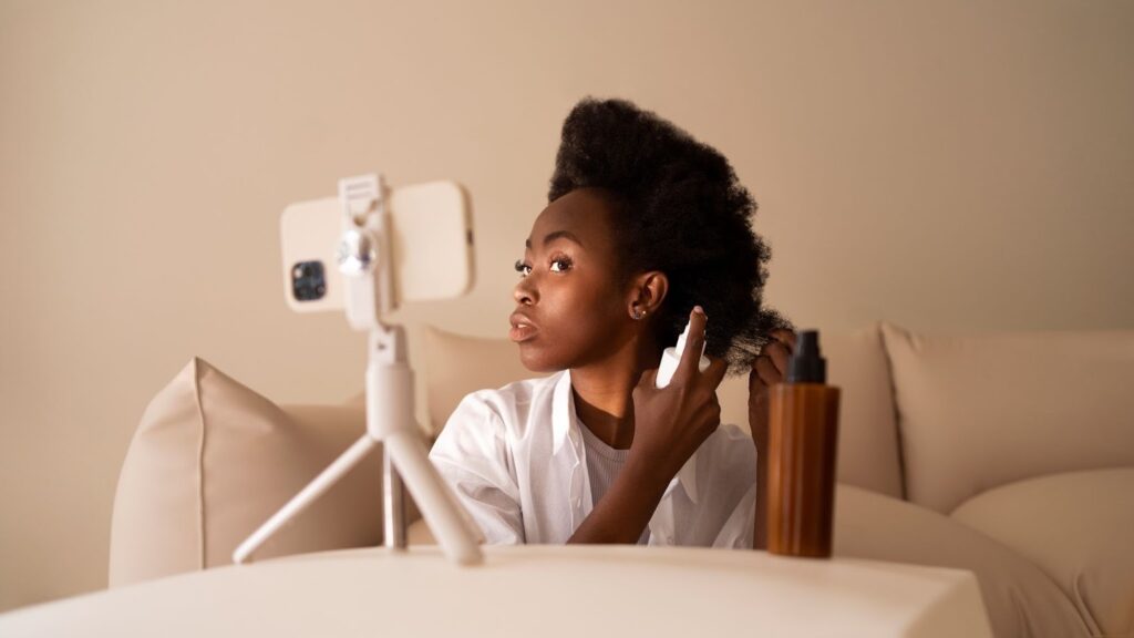 image – VidAU.ai lady working on her brand videos to increase TikTok views