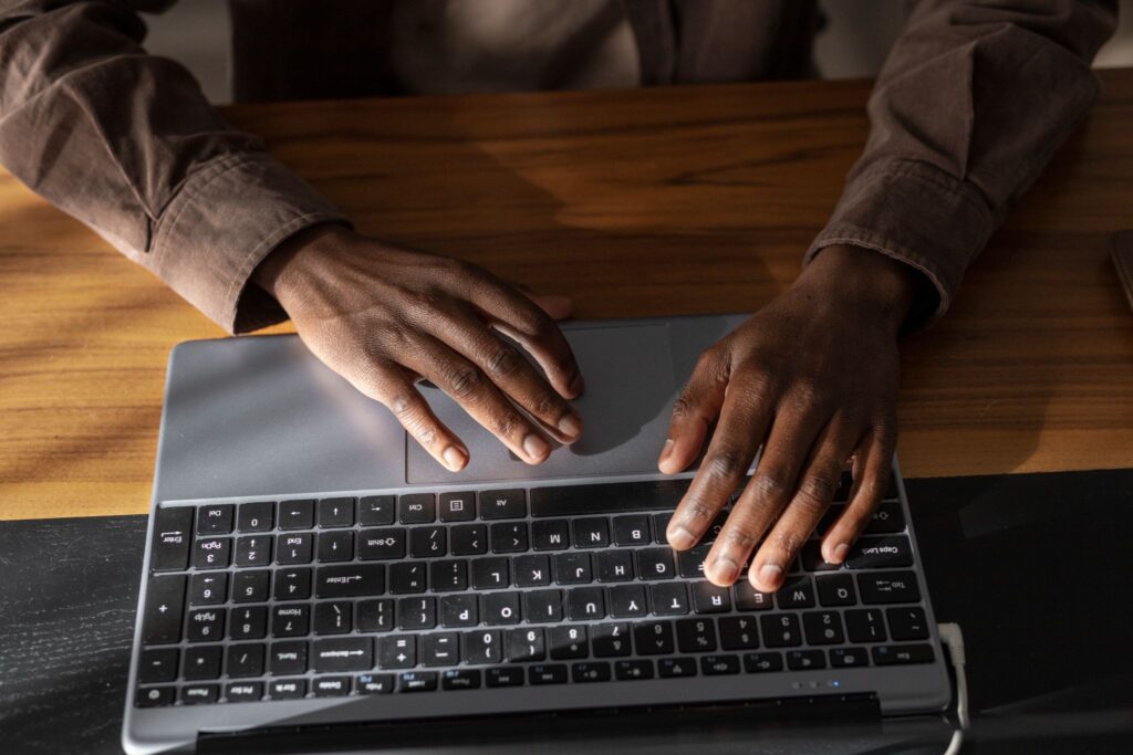 image – VidAU.ai A man typing in his prompt