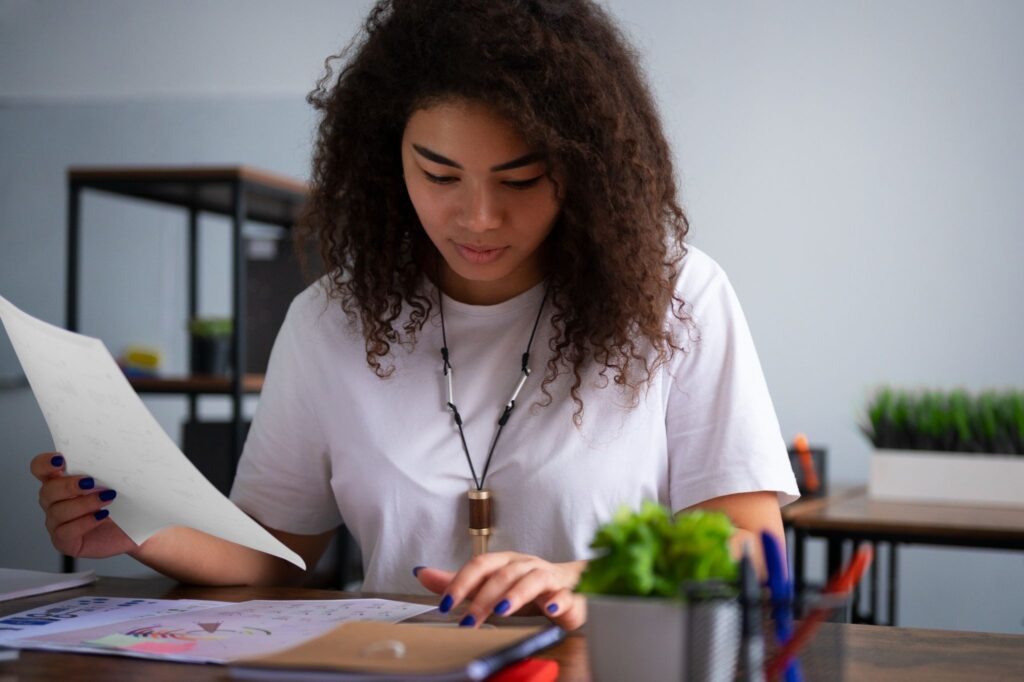 A lady reading Ads manager report